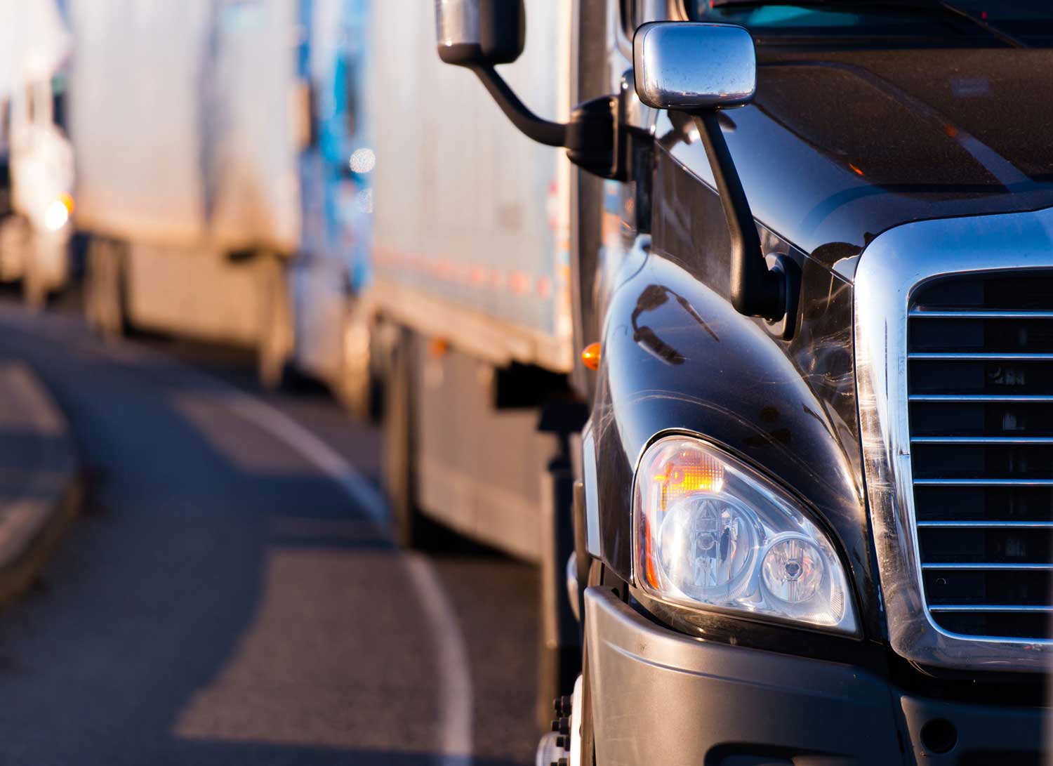 Close up of black truck on the road